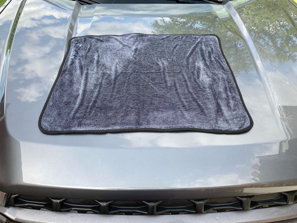 Nasiol Twist Car Drying Towel on the hood